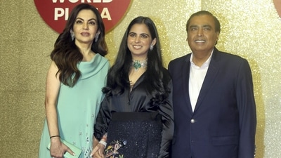 For the grand event, Nita Ambani opted for a beautiful green dress, she kept her makeup heavy and her hair open. Isha, on the other hand, looked beautiful in an all-black outfit. Mukesh Ambani donned a dark formal suit. (PTI) For the grand event, Nita Ambani opted for a beautiful green dress, she kept her makeup heavy and her hair open. Isha, on the other hand, looked beautiful in an all-black outfit. Mukesh Ambani donned a dark formal suit. (PTI)