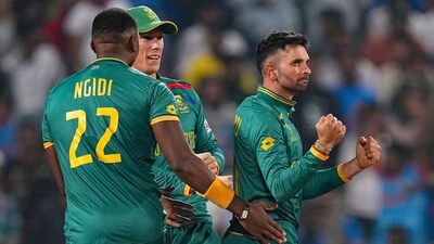 South African bowler Keshav Maharaj celebrates the wicket of New Zealand's Daryl Mitchell (PTI) South African bowler Keshav Maharaj celebrates the wicket of New Zealand's Daryl Mitchell (PTI)