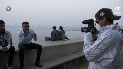 Suryakumar Yadav talks to a fan while posing as a cameraperson Suryakumar Yadav talks to a fan while posing as a cameraperson