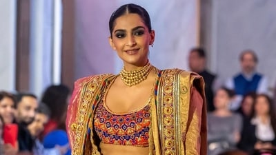 Fashion designers Abu Jani and Sandeep Khosla went for gold and bold with muses Sonam Kapoor Ahuja, Sara Ali Khan and Shehnaaz Gill showcasing their regal creations. Sonam also shared a bunch of images of her look on Instagram before she walked the ramp at the Jio World Plaza launch fashion show. Fashion designers Abu Jani and Sandeep Khosla went for gold and bold with muses Sonam Kapoor Ahuja, Sara Ali Khan and Shehnaaz Gill showcasing their regal creations. Sonam also shared a bunch of images of her look on Instagram before she walked the ramp at the Jio World Plaza launch fashion show. 