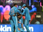 India's Mohammed Shami (C) celebrates with teammates after taking the wicket of Sri Lanka's Kasun Rajitha India's Mohammed Shami (C) celebrates with teammates after taking the wicket of Sri Lanka's Kasun Rajitha