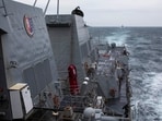 The Arleigh Burke-class guided-missile destroyer USS Ralph Johnson (DDG 114) conducts routine underway operations in the Taiwan Strait.