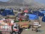 A general view shows Afghan refugees who arrived from Pakistan at a makeshift camp near the Afghanistan-Pakistan Torkham border.