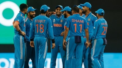 India's Mohammed Shami awaits successfully for the DRS review with teammates after appealing for the wicket of Sri Lanka's Dushmantha Chameera, caught by KL Rahul (REUTERS)