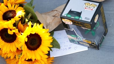 Flowers and a Batman toy seen outside the house of actor Matthew Perry on October 29, 2023 in Los Angeles, California, one day after he died. (Photo by Michael Tran / AFP) (AFP) Flowers and a Batman toy seen outside the house of actor Matthew Perry on October 29, 2023 in Los Angeles, California, one day after he died. (Photo by Michael Tran / AFP) (AFP)