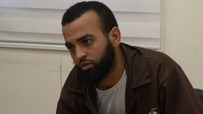 Omar Sami Marzuk Abu Rusha, a member of Hamas’ Nukhba special forces, told the interrogator that he was among the forces deployed to Kfar Aza, near the Gaza border (i24 News) Omar Sami Marzuk Abu Rusha, a member of Hamas’ Nukhba special forces, told the interrogator that he was among the forces deployed to Kfar Aza, near the Gaza border (i24 News)