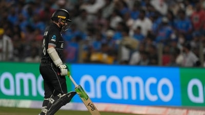 New Zealand's captain Tom Latham leaves the ground after losing his wicket during the ICC Men's Cricket World Cup match between New Zealand and South Africa in Pune (AP) New Zealand's captain Tom Latham leaves the ground after losing his wicket during the ICC Men's Cricket World Cup match between New Zealand and South Africa in Pune (AP)