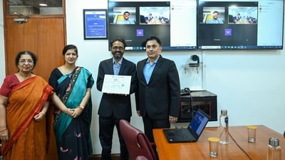 Prof Jain (Dean Administration) with Prof Pranesh Mishra, Chairman, Brandscapes (Handout) Prof Jain (Dean Administration) with Prof Pranesh Mishra, Chairman, Brandscapes (Handout)
