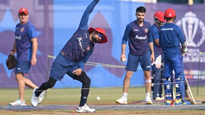Rashid Khan (left) bowls as pacer Naveen-ul-Haq (right) watches him during Afghanistan’s training session in Lucknow on Wednesday (HT_PRINT) Rashid Khan (left) bowls as pacer Naveen-ul-Haq (right) watches him during Afghanistan’s training session in Lucknow on Wednesday (HT_PRINT)