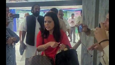 TMC MP Mahua Moitra stages a walkout with Oppn MPs. (ANI) TMC MP Mahua Moitra stages a walkout with Oppn MPs. (ANI)