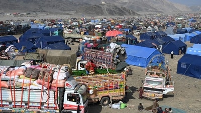 A general view shows Afghan refugees who arrived from Pakistan at a makeshift camp near the Afghanistan-Pakistan Torkham border. (AFP) A general view shows Afghan refugees who arrived from Pakistan at a makeshift camp near the Afghanistan-Pakistan Torkham border. (AFP)