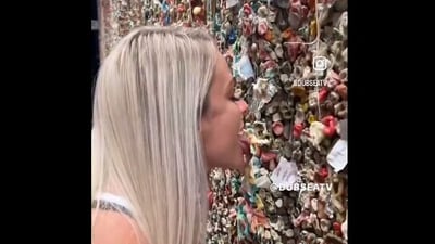 The image shows a streamer licking the Gum Wall in Seattle. (Screengrab) The image shows a streamer licking the Gum Wall in Seattle. (Screengrab)