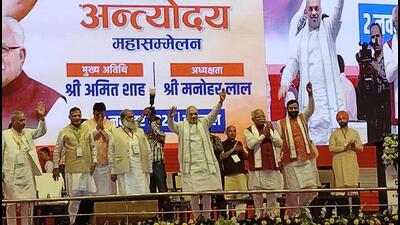 Union home minister Amit Shah (centre) at the Antouday Mahasammelan in Karnal on Thursday. Chief minister Manohar Lal Khattar, newly appointed state BJP president Nayab Singh Saini, state party affairs in-charge Biplab Deb and Haryana ministers attended the rally. (HT Photo) Union home minister Amit Shah (centre) at the Antouday Mahasammelan in Karnal on Thursday. Chief minister Manohar Lal Khattar, newly appointed state BJP president Nayab Singh Saini, state party affairs in-charge Biplab Deb and Haryana ministers attended the rally. (HT Photo)