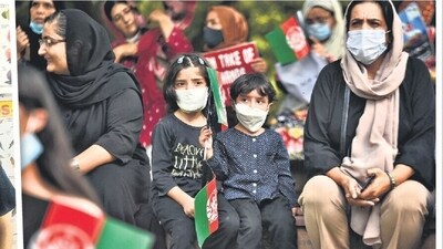 Yosuf Noor was one of the 180 students at the the Sayed Jamaluddin Afghan school in Bhogal; (right) A protest against the Taliban. Yosuf Noor was one of the 180 students at the the Sayed Jamaluddin Afghan school in Bhogal; (right) A protest against the Taliban.