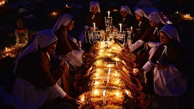 This image taken in Puruliya village shows people marking the All Souls’ Day, which remembers the loved ones who have died. (Sanghamitra Sarkar/2016 Sony World Photography Awards) This image taken in Puruliya village shows people marking the All Souls’ Day, which remembers the loved ones who have died. (Sanghamitra Sarkar/2016 Sony World Photography Awards)