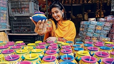 Anjali Arora goes #VocalForLocal as she advocates for buying directly from the artisans. At the Potters’ Lane in Sarojini Market, she bought 100 diyas for her house in Kalkaji. (Photo: Gokul VS/HT) Anjali Arora goes #VocalForLocal as she advocates for buying directly from the artisans. At the Potters’ Lane in Sarojini Market, she bought 100 diyas for her house in Kalkaji. (Photo: Gokul VS/HT)