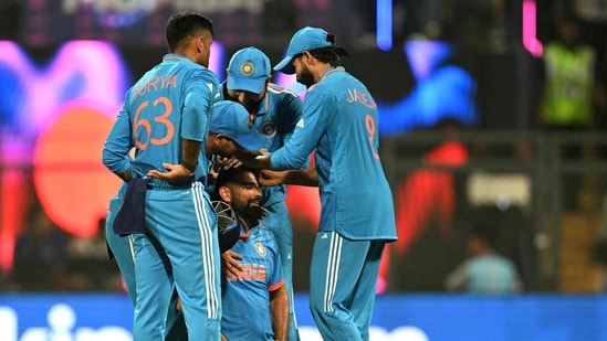 India's Mohammed Shami (C) celebrates with teammates after taking the wicket of Sri Lanka's Kasun Rajitha (AFP)