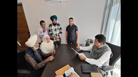 Haryana assembly speaker and MLA Gian Chand Gupta hearing the grievances of people during Janata Darbar at HSVP Field Hostel, Sector 6, in Panchkula on Thursday. (HT photo)