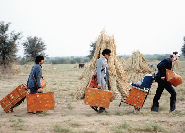 Even those guys from The Darjeeling Limited love lugging everything.