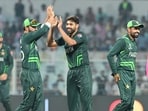 Harris Rauf with Babar Azam of Pakistan Cricket Team celebrates his 2nd wicket against Bangladesh during ICC Men's Cricket World Cup 2023 match at Eden Garden Harris Rauf with Babar Azam of Pakistan Cricket Team celebrates his 2nd wicket against Bangladesh during ICC Men's Cricket World Cup 2023 match at Eden Garden