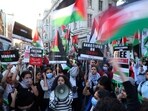 Pro-Palestinian demonstrators protest during the ongoing conflict between Israel and the Palestinian Islamist group Hamas, near the Israeli embassy in London. (Reuters/File)