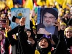 Supporters of the Iranian-backed Hezbollah group shout slogans, as they wait the speech of Hezbollah leader Sayyed Hassan Nasrallah, during a rally in Beirut, Lebanon, on November 3. Supporters of the Iranian-backed Hezbollah group shout slogans, as they wait the speech of Hezbollah leader Sayyed Hassan Nasrallah, during a rally in Beirut, Lebanon, on November 3.