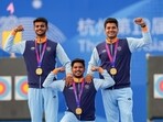 Gold medalist Indian archers Abhishek Verma, Prathamesh Samadhan Jawkar (left) and Ojas Pravin Deotale pose for photos during the presentation ceremony of the Compound Men's Team Archery event at the 19th Asian Games Gold medalist Indian archers Abhishek Verma, Prathamesh Samadhan Jawkar (left) and Ojas Pravin Deotale pose for photos during the presentation ceremony of the Compound Men's Team Archery event at the 19th Asian Games