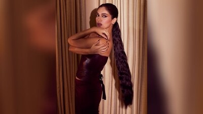 Assisted by hairstylist Sanky Evrus, Bhumi styled her long, lush locks into soft curls and tied them into a neat, low ponytail to complete her gorgeous look. (Instagram/@bhumipednekar) Assisted by hairstylist Sanky Evrus, Bhumi styled her long, lush locks into soft curls and tied them into a neat, low ponytail to complete her gorgeous look. (Instagram/@bhumipednekar)