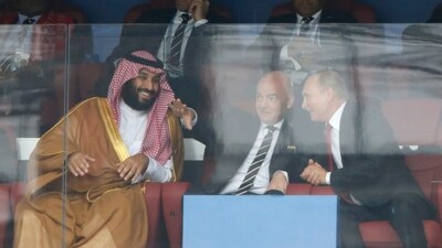 From Left: Saudi Arabia Crown Prince Mohammed bin Salman, FIFA President Gianni Infantino and Russian President Vladimir Putin watch the match between Russia and Saudi Arabia. (AP) From Left: Saudi Arabia Crown Prince Mohammed bin Salman, FIFA President Gianni Infantino and Russian President Vladimir Putin watch the match between Russia and Saudi Arabia. (AP)