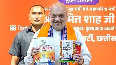 Union Home Minister Amit Shah releases BJP's manifesto for Chhattisgarh (ANI) Union Home Minister Amit Shah releases BJP's manifesto for Chhattisgarh (ANI)