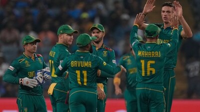 South Africa's Marco Jansen, right, celebrates the wicket of New Zealand's Tim Southee with his team players during the ICC Men's Cricket World Cup match between New Zealand and South Africa (AP) South Africa's Marco Jansen, right, celebrates the wicket of New Zealand's Tim Southee with his team players during the ICC Men's Cricket World Cup match between New Zealand and South Africa (AP)