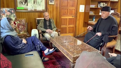 Jammu and Kashmir National Conference (JKNC) chief Farooq Abdullah chairs the People's Alliance for Gupkar Declaration (PAGD) meeting with People's Democratic Party (PDP) chief Mehbooba Mufti and others, at his residence, in Srinagar on Friday. Farooq said that meeting was held to discuss the Palestine issue. (ANI)