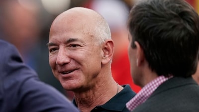 FILE - Amazon founder Jeff Bezos is seen on the sidelines before the start of an NFL football game, Sept. 15, 2022, in Kansas City, Mo. (AP Photo/Charlie Riedel, File) (AP) FILE - Amazon founder Jeff Bezos is seen on the sidelines before the start of an NFL football game, Sept. 15, 2022, in Kansas City, Mo. (AP Photo/Charlie Riedel, File) (AP)