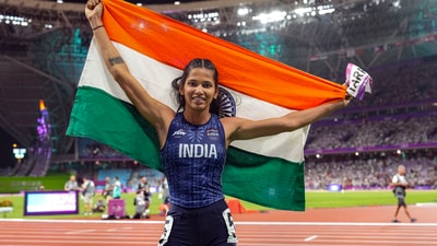 India's Jyothi Yarraji celebrates after winning silver medal in the women's 100-meter hurdles final event at the 19th Asian Games, in Hangzhou (PTI) India's Jyothi Yarraji celebrates after winning silver medal in the women's 100-meter hurdles final event at the 19th Asian Games, in Hangzhou (PTI)