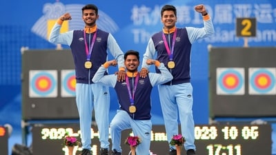 Gold medalist Indian archers Abhishek Verma, Prathamesh Samadhan Jawkar (left) and Ojas Pravin Deotale pose for photos during the presentation ceremony of the Compound Men's Team Archery event at the 19th Asian Games (PTI) Gold medalist Indian archers Abhishek Verma, Prathamesh Samadhan Jawkar (left) and Ojas Pravin Deotale pose for photos during the presentation ceremony of the Compound Men's Team Archery event at the 19th Asian Games (PTI)
