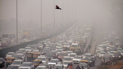 Vehicles on the Delhi-Gurugram Expressway amid hazy weather conditions, in Gurugram. (PTI) Vehicles on the Delhi-Gurugram Expressway amid hazy weather conditions, in Gurugram. (PTI)