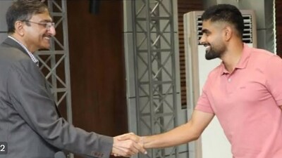 PCB chief Zaka Ashraf shaking hands with Pakistan captain Babar Azam PCB chief Zaka Ashraf shaking hands with Pakistan captain Babar Azam