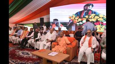 U.P. CM Yogi Adityanath along with state BJP chief Bhupendra Chaudhary participating in SC/ST regional conference in Gorakhpur on November 3. (HT photo)