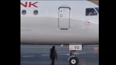 Woman trying to stop the flight. (Facebook/@FL360aero)