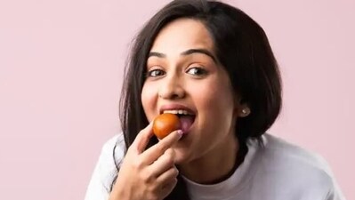 "We are all geared up for the festive season. But having a healthy mouth during the festive season is one such need that people tend to ignore. Many of us tend to overindulge in sugary foods and sugary beverages during festivals. This can lead to a series of problems such as tooth decay, bad breath, or food trapped between the teeth," says Dr Surbhi Bhatia L, Chief Dentist, CEO of Lifeberries Health. Dr Surbhi shares some dental health tips for festive season to protect your teeth from decay and damage. (Shutterstock) "We are all geared up for the festive season. But having a healthy mouth during the festive season is one such need that people tend to ignore. Many of us tend to overindulge in sugary foods and sugary beverages during festivals. This can lead to a series of problems such as tooth decay, bad breath, or food trapped between the teeth," says Dr Surbhi Bhatia L, Chief Dentist, CEO of Lifeberries Health. Dr Surbhi shares some dental health tips for festive season to protect your teeth from decay and damage. (Shutterstock)