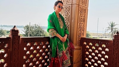 Kangana shared several glimpses of herself from her trip to Somnath Temple in Gujarat. She decked up in a green and maroon salwar-suit and heavy gold necklace and earrings to go with the outfit. Here, she is seen posing in shades. Kangana shared several glimpses of herself from her trip to Somnath Temple in Gujarat. She decked up in a green and maroon salwar-suit and heavy gold necklace and earrings to go with the outfit. Here, she is seen posing in shades. 