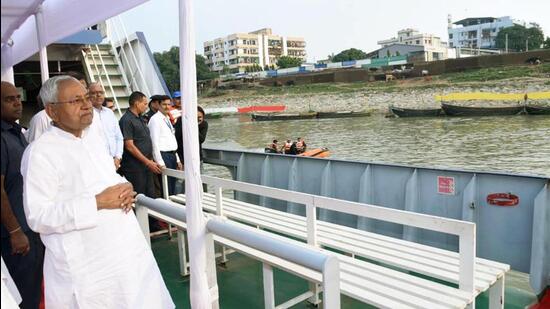 Chief minister Nitish Kumar inspects preparations for Chhath festival, in Patna on Friday. (Santosh Kumar/HT)