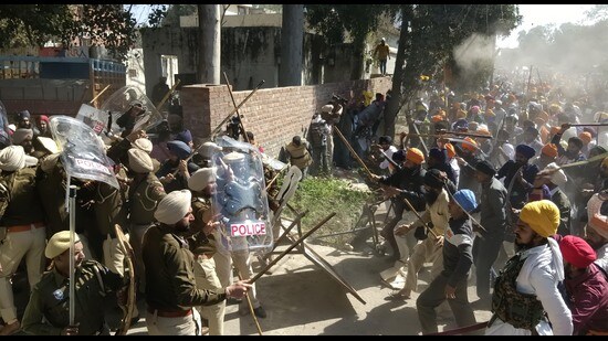 Supporters of Waris Punjab De chief Amritpal Singh clashing with police personnel in Ajnala. (HT file)