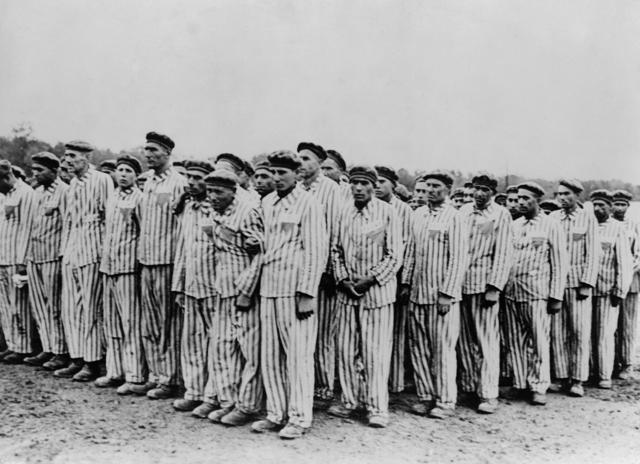 Roll call at Buchenwald concentration camp, ca.1938-1941. (Everett Collection/Shutterstock) Roll call at Buchenwald concentration camp, ca.1938-1941. (Everett Collection/Shutterstock)