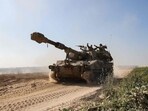 An Israeli army artillery howitzer moves near the border with the Gaza Strip in southern Israel on November 3. An Israeli army artillery howitzer moves near the border with the Gaza Strip in southern Israel on November 3.