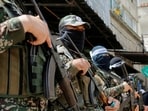 Palestinian militants attend Hamas rally Solidarity with Al-Aqsa in Jabalia in northern Gaza April 7, 2023.