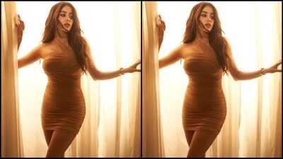 Her dress features a sensual one-shoulder design that wraps the silhouette, ruched detailing all around, a mini hemline and a bodycon fit that perfectly hugs the body and accentuates her gorgeous curves. (Instagram/@janhvikapoor)