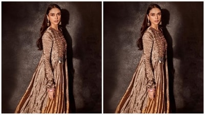 She styled her long locks into soft curls and left them open at the centre part, cascading beautifully down her shoulders and complementing her stunning ethnic look. (Instagram/@aditiraohydari) She styled her long locks into soft curls and left them open at the centre part, cascading beautifully down her shoulders and complementing her stunning ethnic look. (Instagram/@aditiraohydari)
