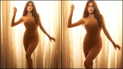 On Friday, Janhvi gave her fans a sweet surprise as the actress took to Instagram and uploaded a series of pictures. In the post, she is seen wearing a stunning beige dress by luxury brand Alexander Wang, which comes with a price tag of  <span class='webrupee'>₹</span>43,000. (Instagram/@janhvikapoor)