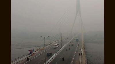 A thick layer of haze obscures the Signature Bridge on Saturday. (ANI) A thick layer of haze obscures the Signature Bridge on Saturday. (ANI)